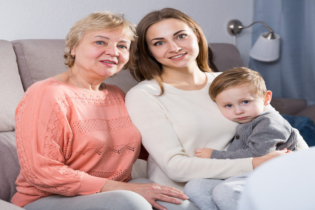 Portrait of happy family who is resting together at home
